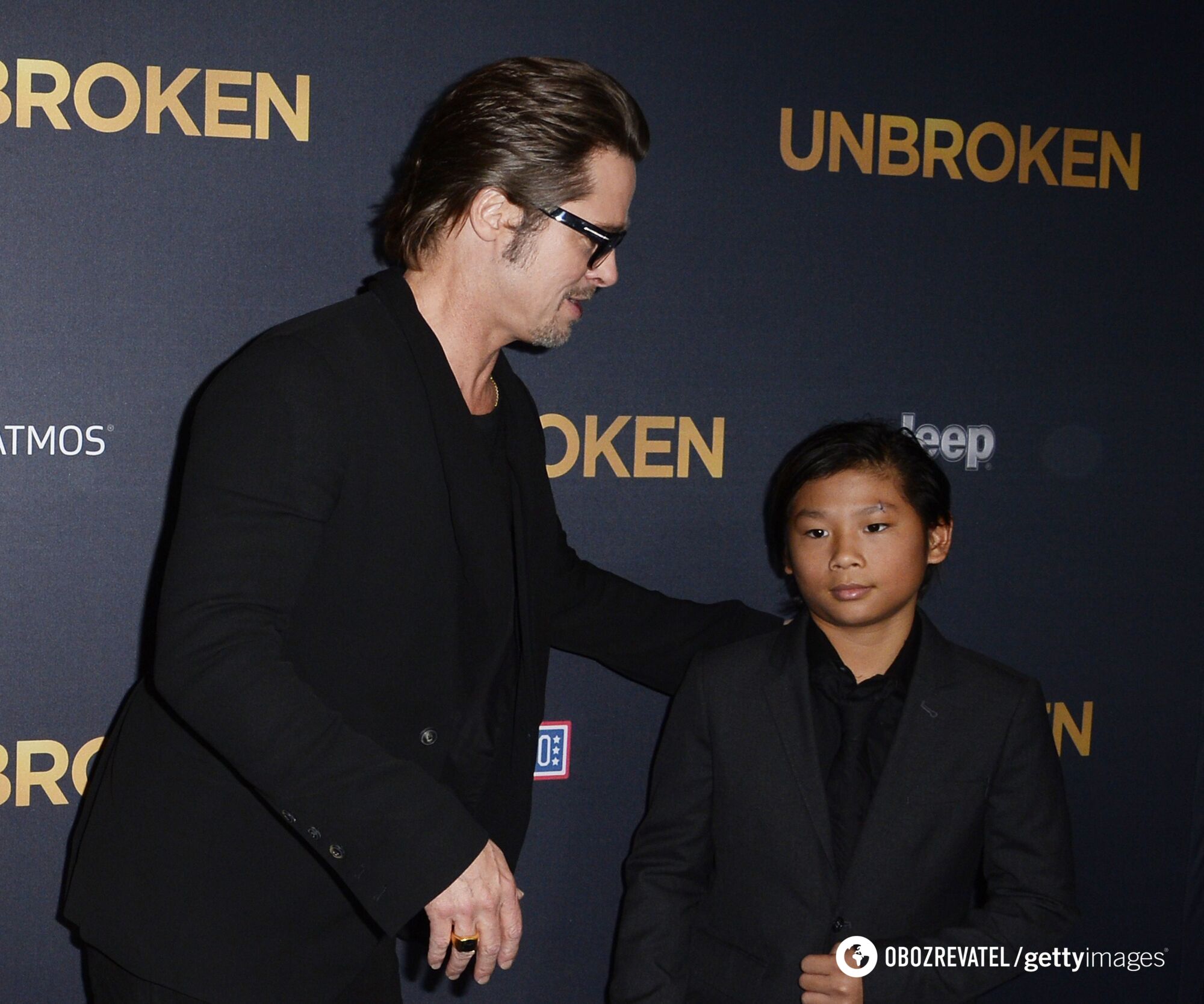 The adopted son of Angelina Jolie and Brad Pitt called the actor a ''scoundrel'' and a ''mean man'' who makes children tremble with fear