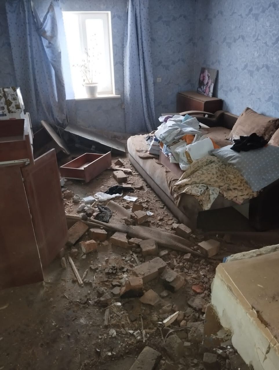 Russian forces targeted residential buildings in theSumy region with multiple rocket launchers: three people died, including a child. Photo