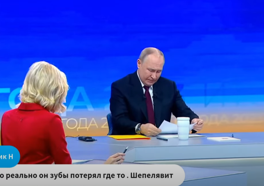 Putin i napis ''o gospodarce''