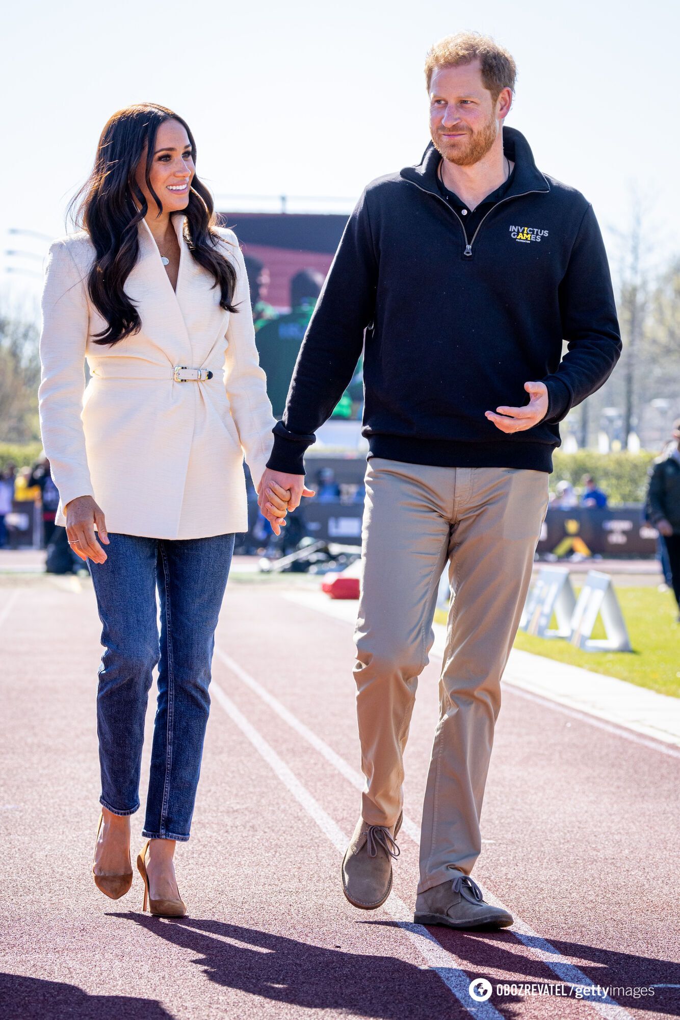 Meghan Markle and Prince Harry arrive at the hotel on the eve of the Invictus Games opening.