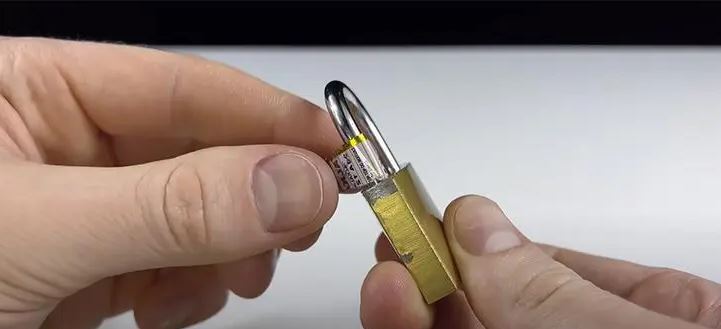 How to open a lock without a key: a regular battery will help