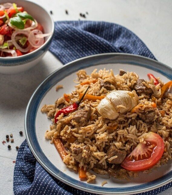 Pork pilaf in the oven