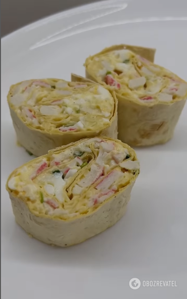 Elementary appetizer with crab sticks: prepared in lavash