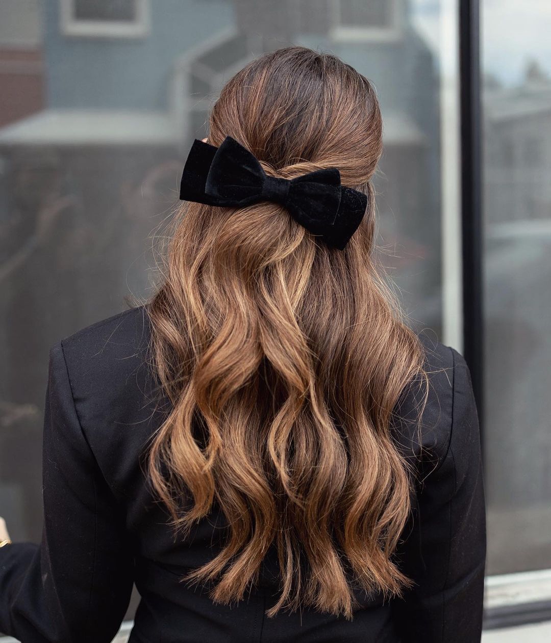 Hairstyle with a velvet bow