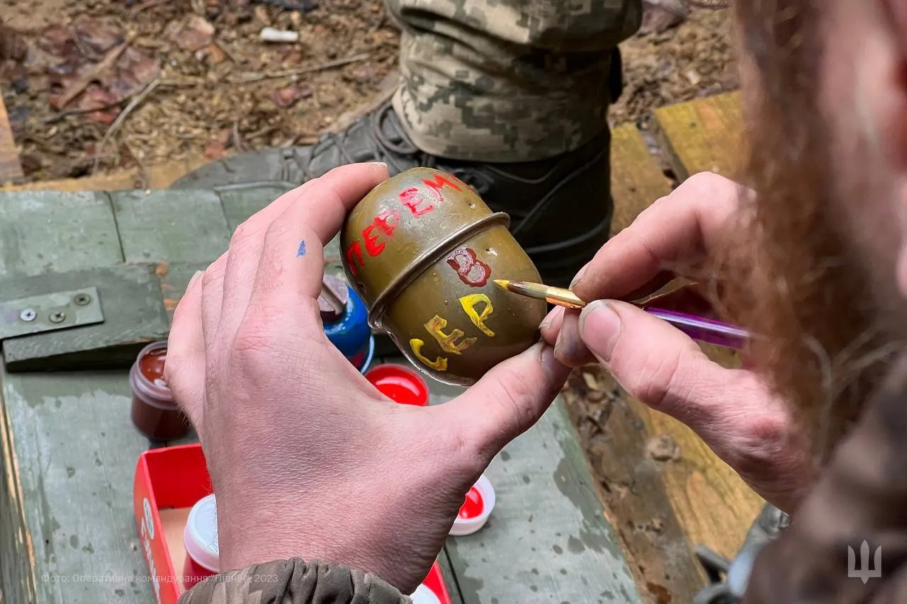 Ukrainian Armed Forces soldiers painted hand grenades in the form of Easter eggs.