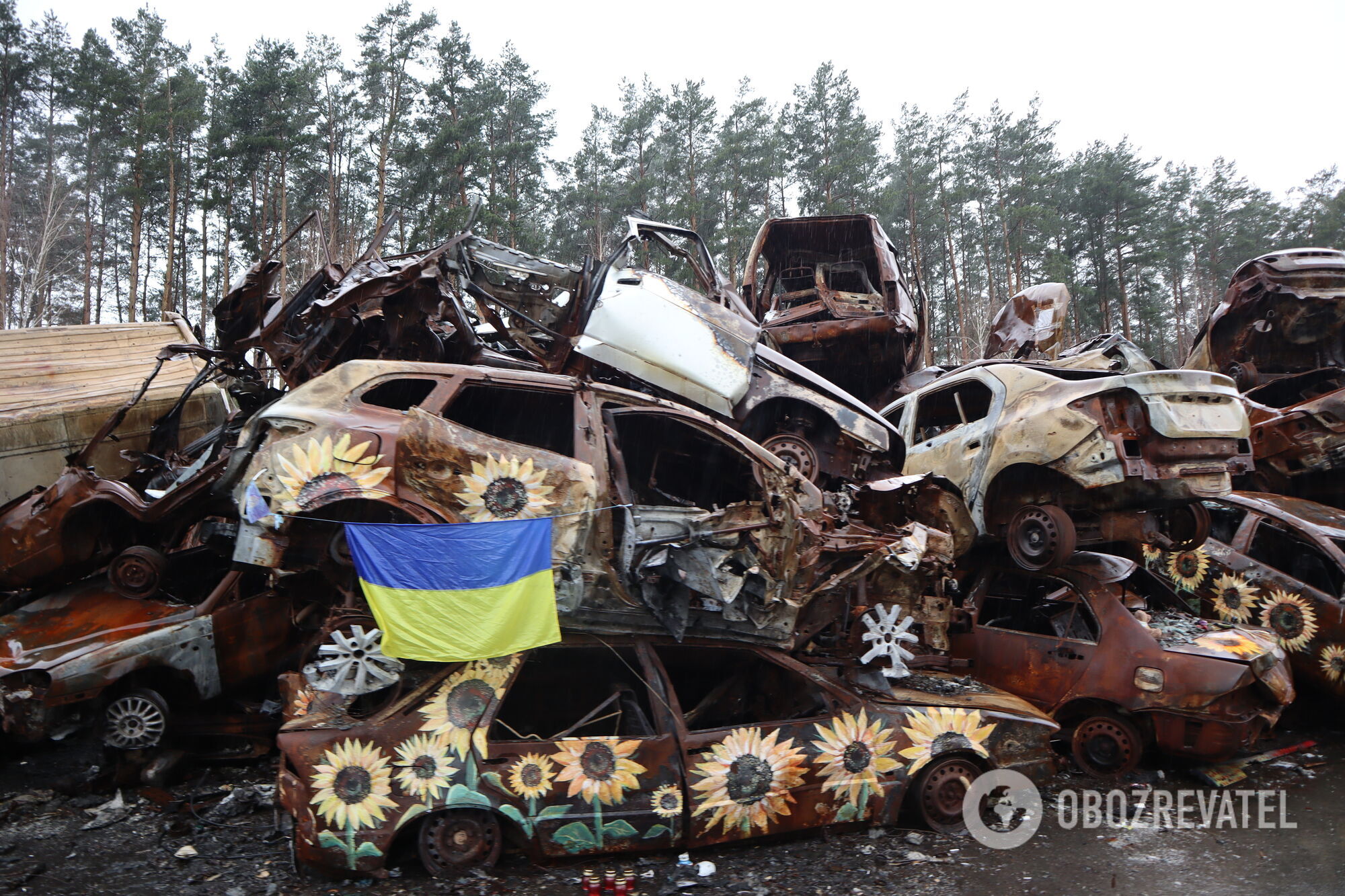 A dump of war-damaged cars in Irpin, March 23.