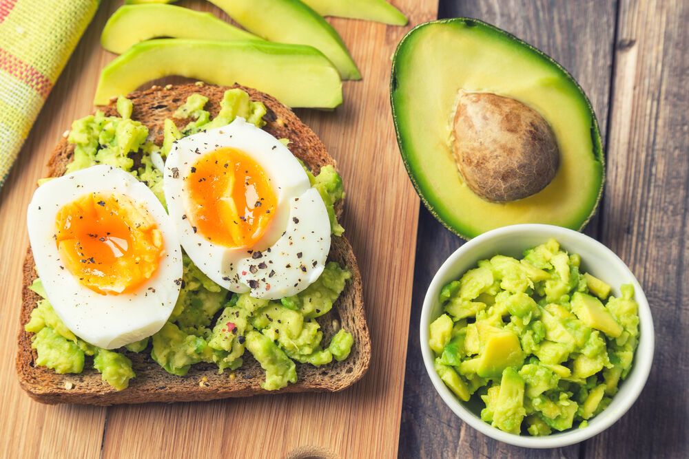 Light toast with avocado and egg