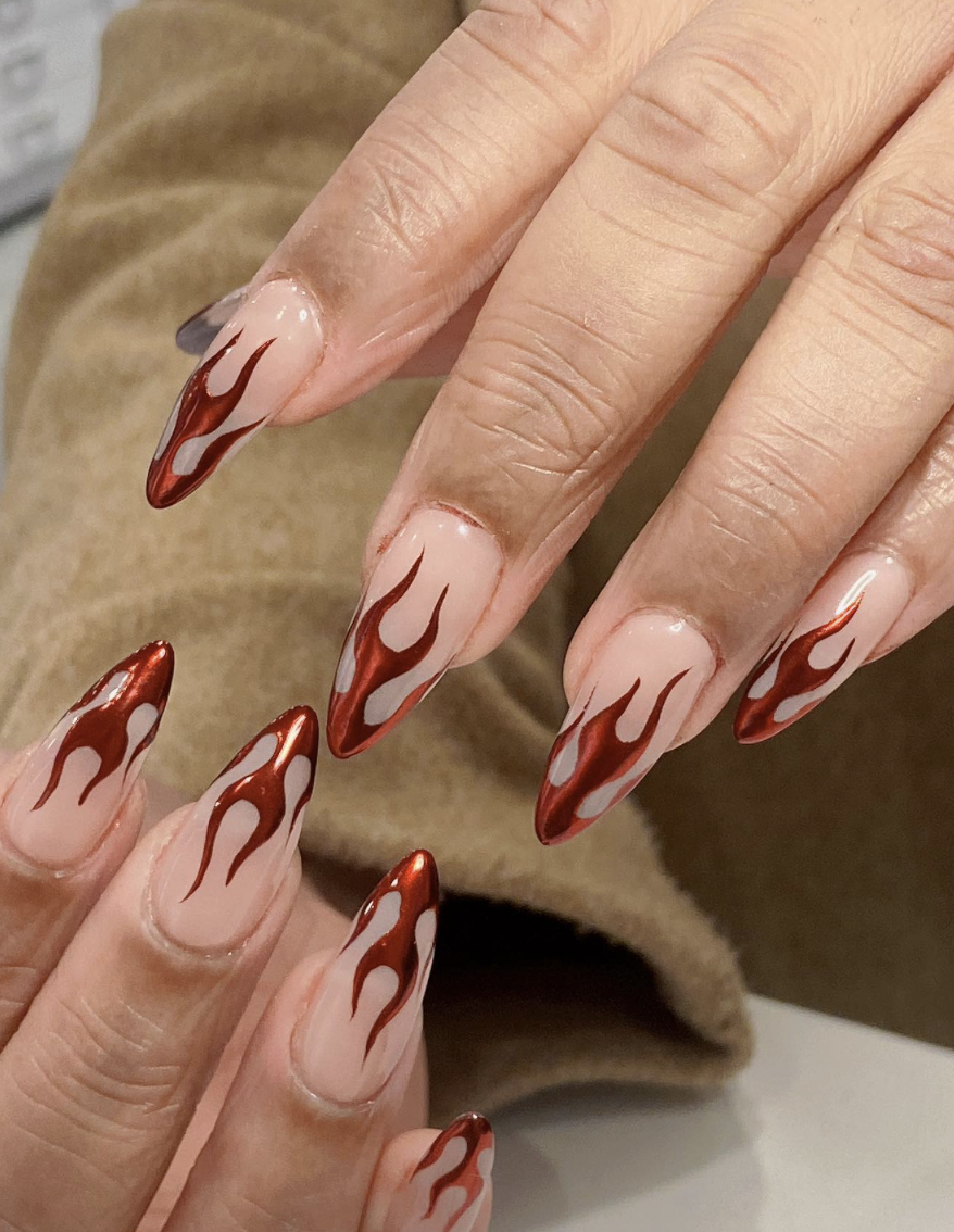 Aries opt for a fiery manicure.