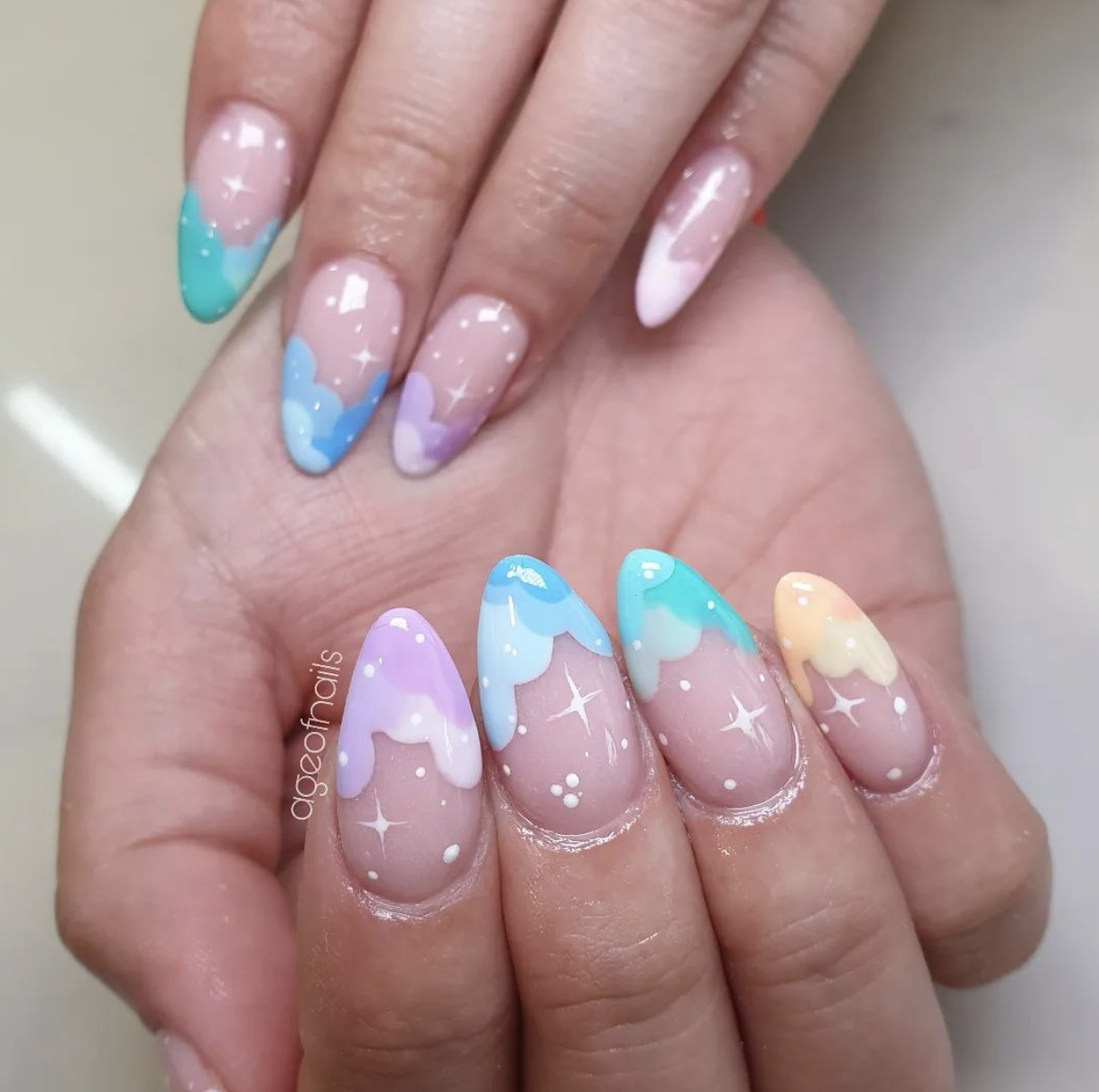 Sagittarians paint the sky on their nails.