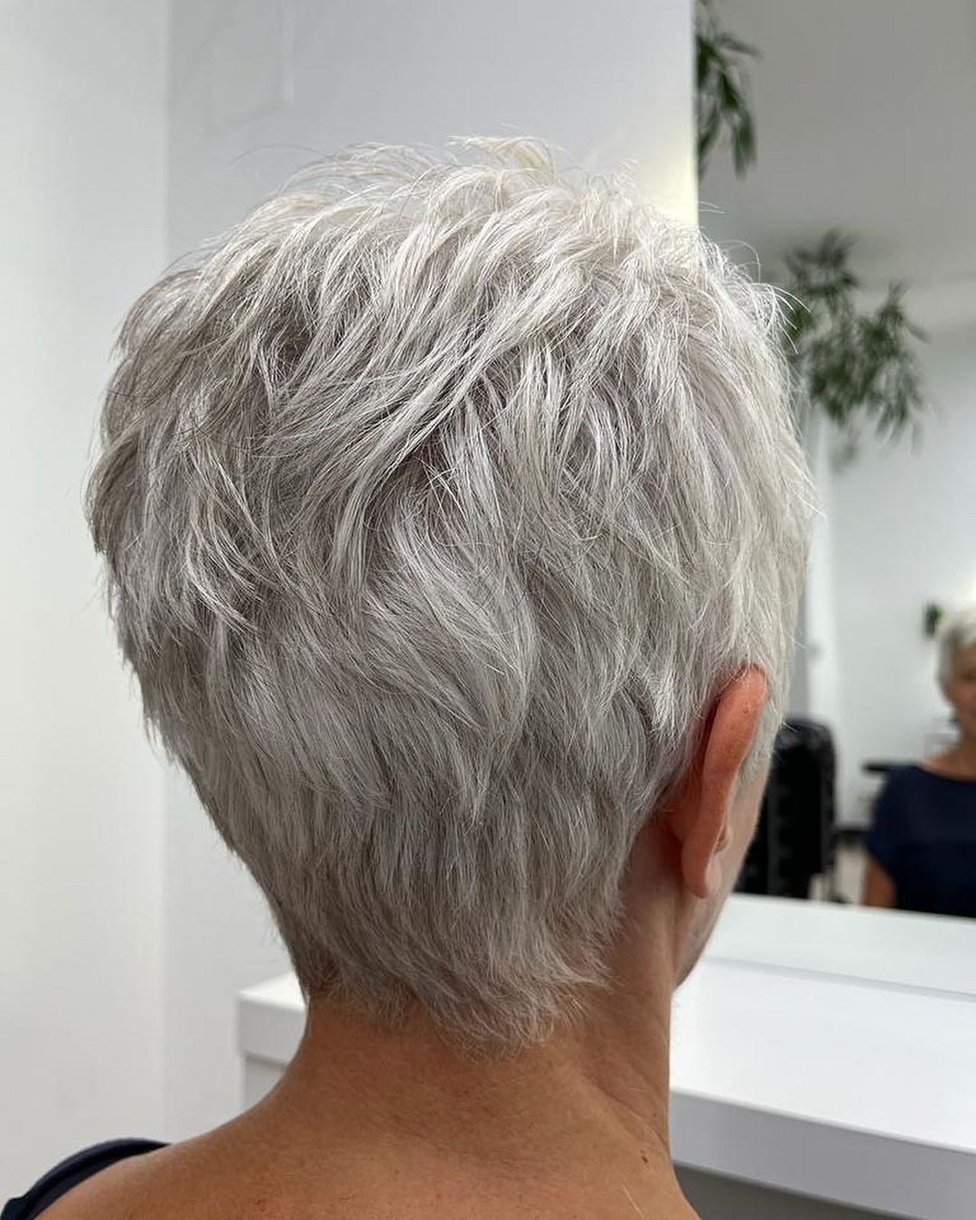 Refreshing and facelifting effect: three best haircuts for women over 50. Photo