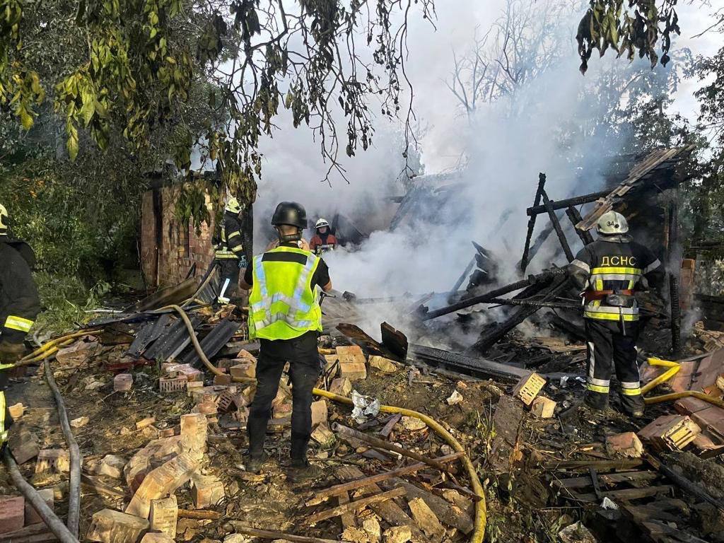Missiles and drones debris damaged houses and fell on the cemetery in the Kyiv region: a fire broke out, there are victims. Photo