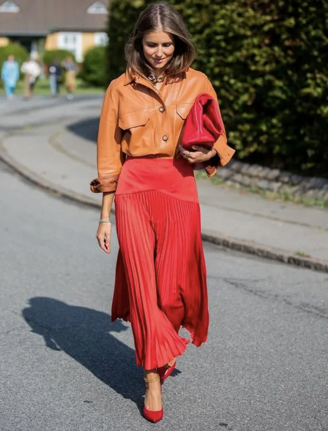 A leather shirt and skirt is a great combination.