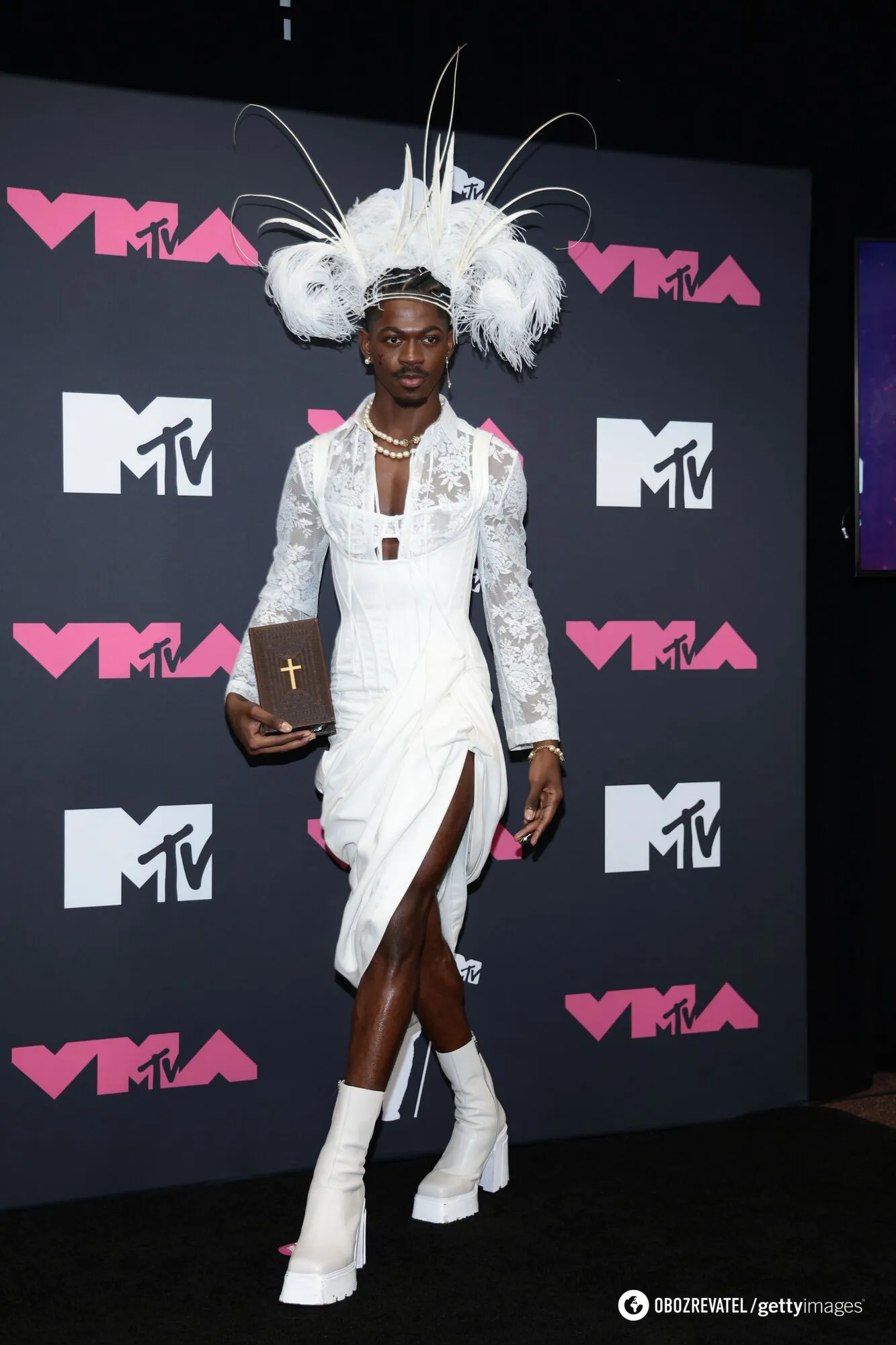 Spider web outfits and translucent dresses: stars struck candid looks on the red carpet of the MTV VMA 2023. Photo
