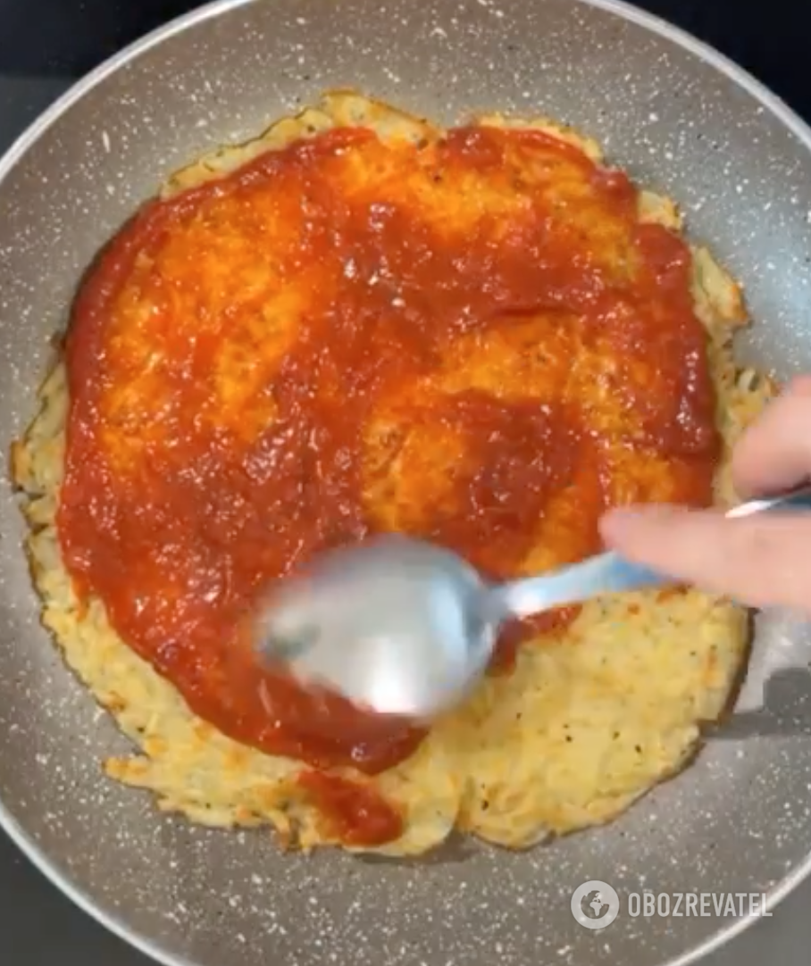 Homemade pizza on a frying pan
