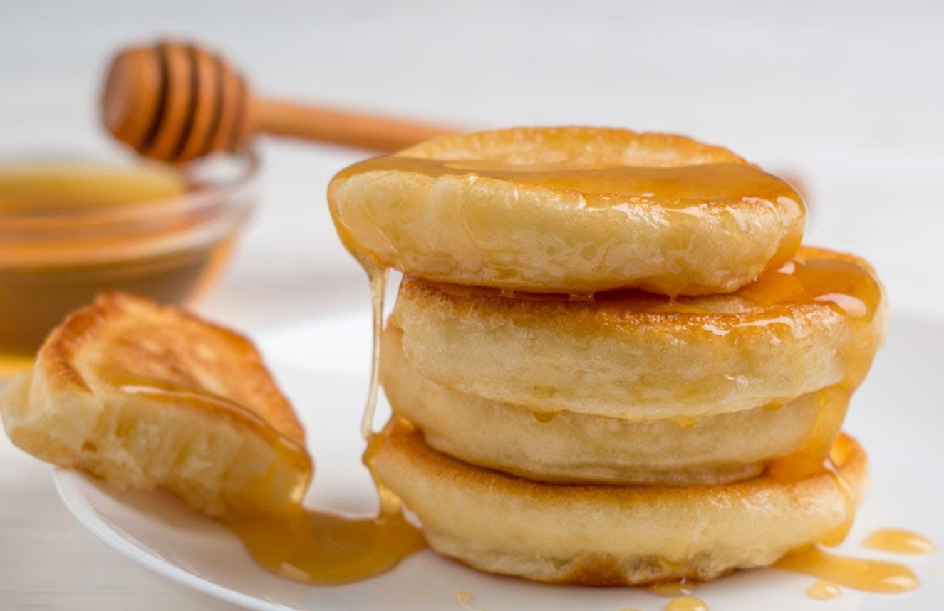 Puffy pancakes with honey