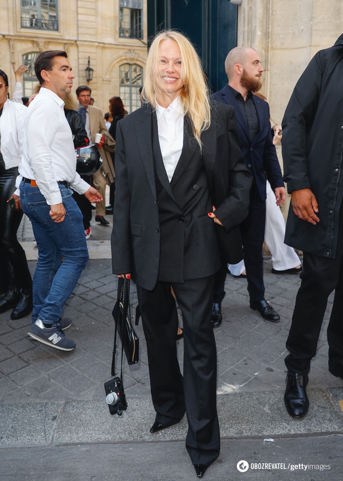 Pamela Anderson, 56, Goes Makeup-Free at Paris Fashion Week