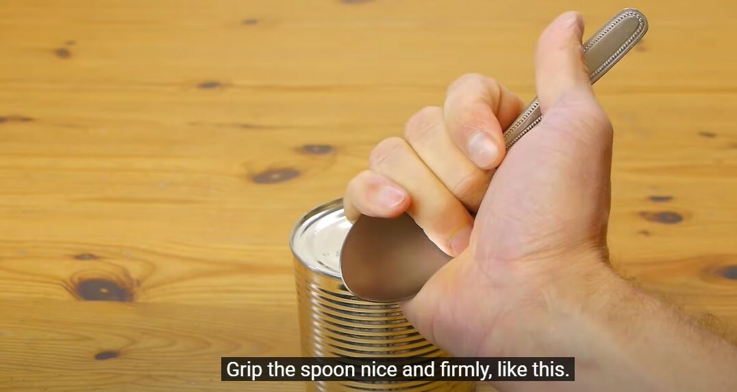 A clever lifehack to open a canning jar with a spoon