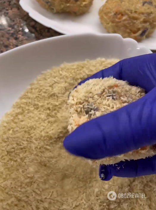 Dipping the formed cutlets in breadcrumbs
