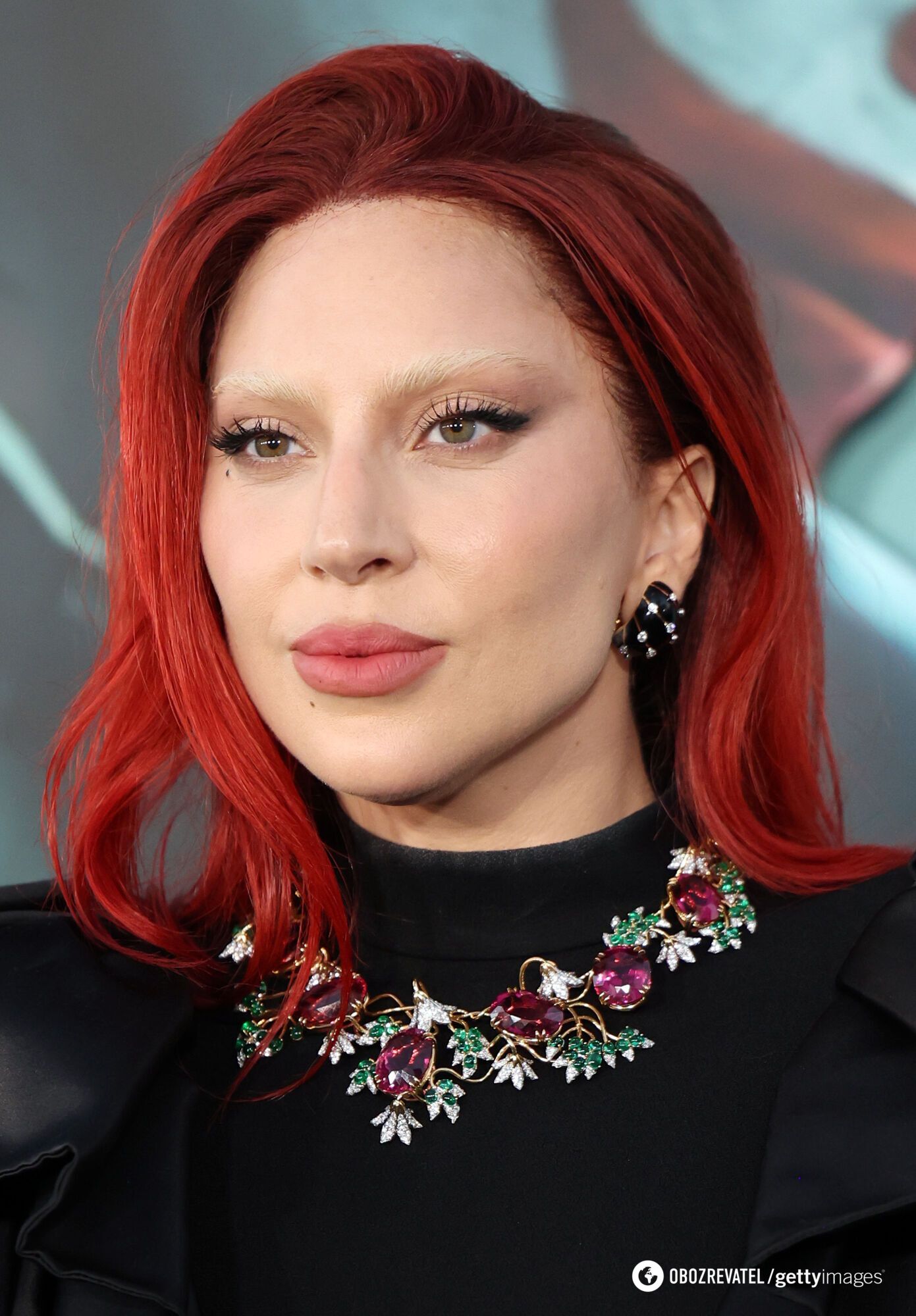 With white eyebrows and red hair: Lady Gaga hits the red carpet in a new look. Photo.