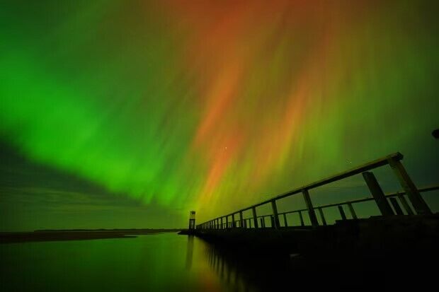 The real magic of nature: the aurora borealis illuminated the world. Photo