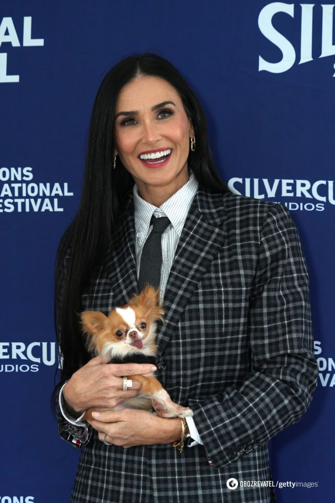 Like the owners: photos of stars and their four-legged pets that will make you smile