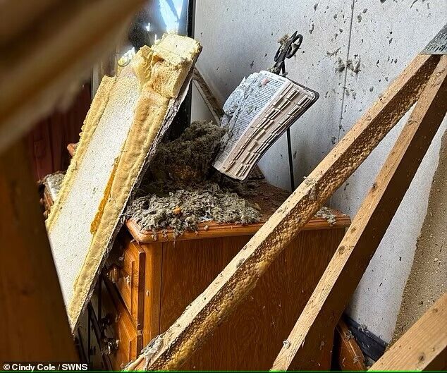 ''The earth will be destroyed.'' A biblical sign was found in the yard of a house destroyed by a hurricane in the United States