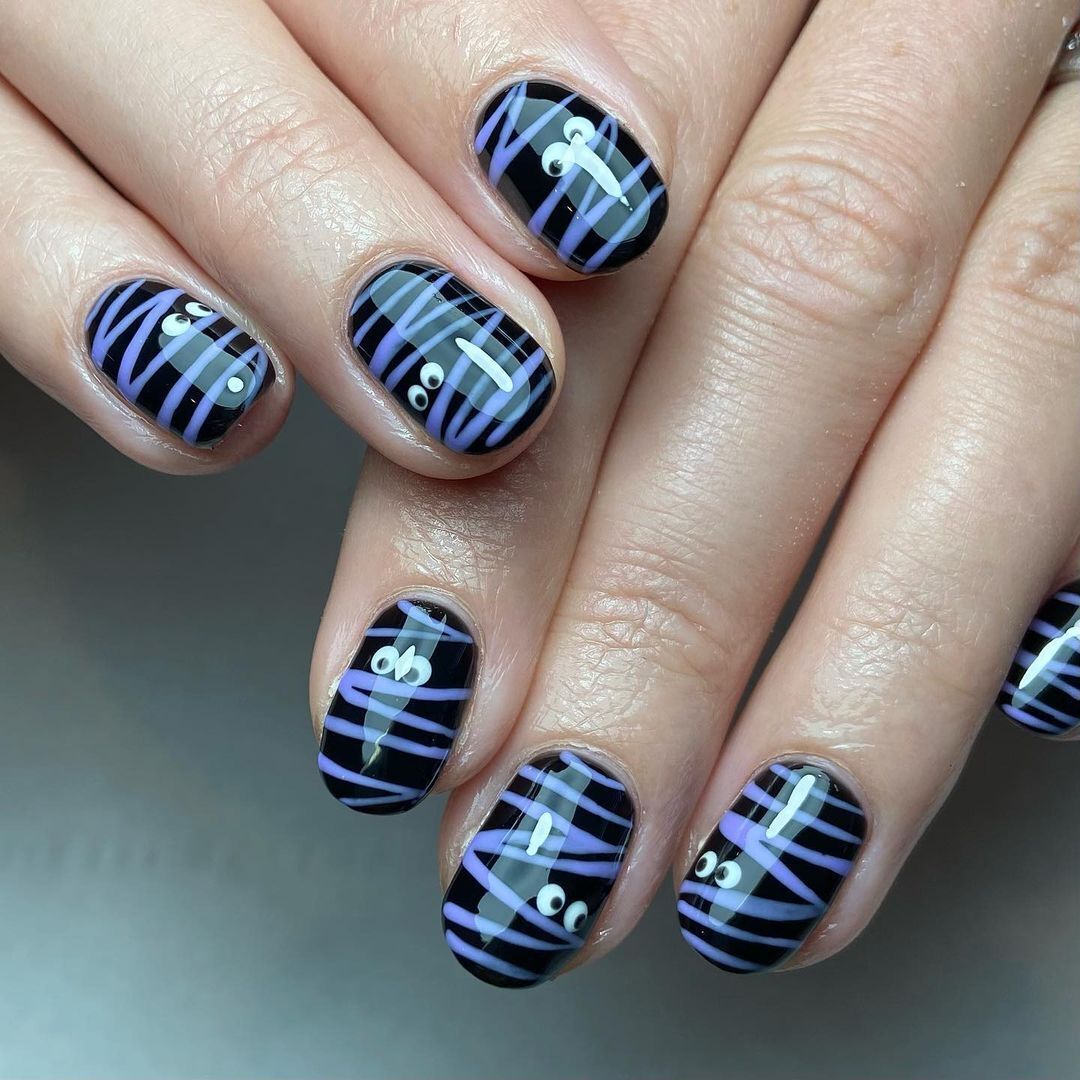 From a witch woman to a mummy and a cowboy skeleton. 10 super stylish Halloween manicure ideas