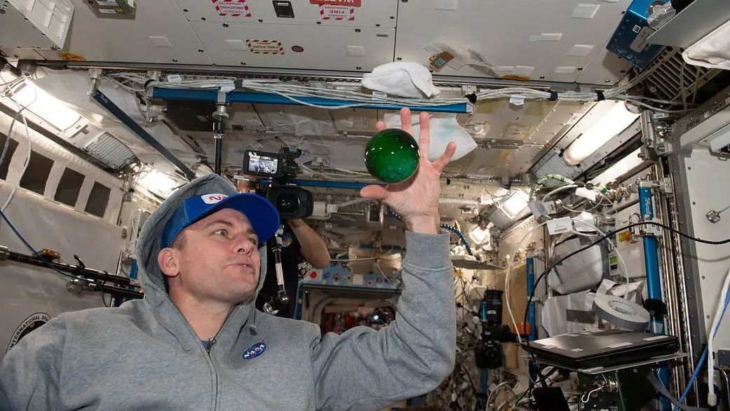 A NASA astronaut has created a ''Jupiter-like planet'' on the ISS using water and food coloring. Photo