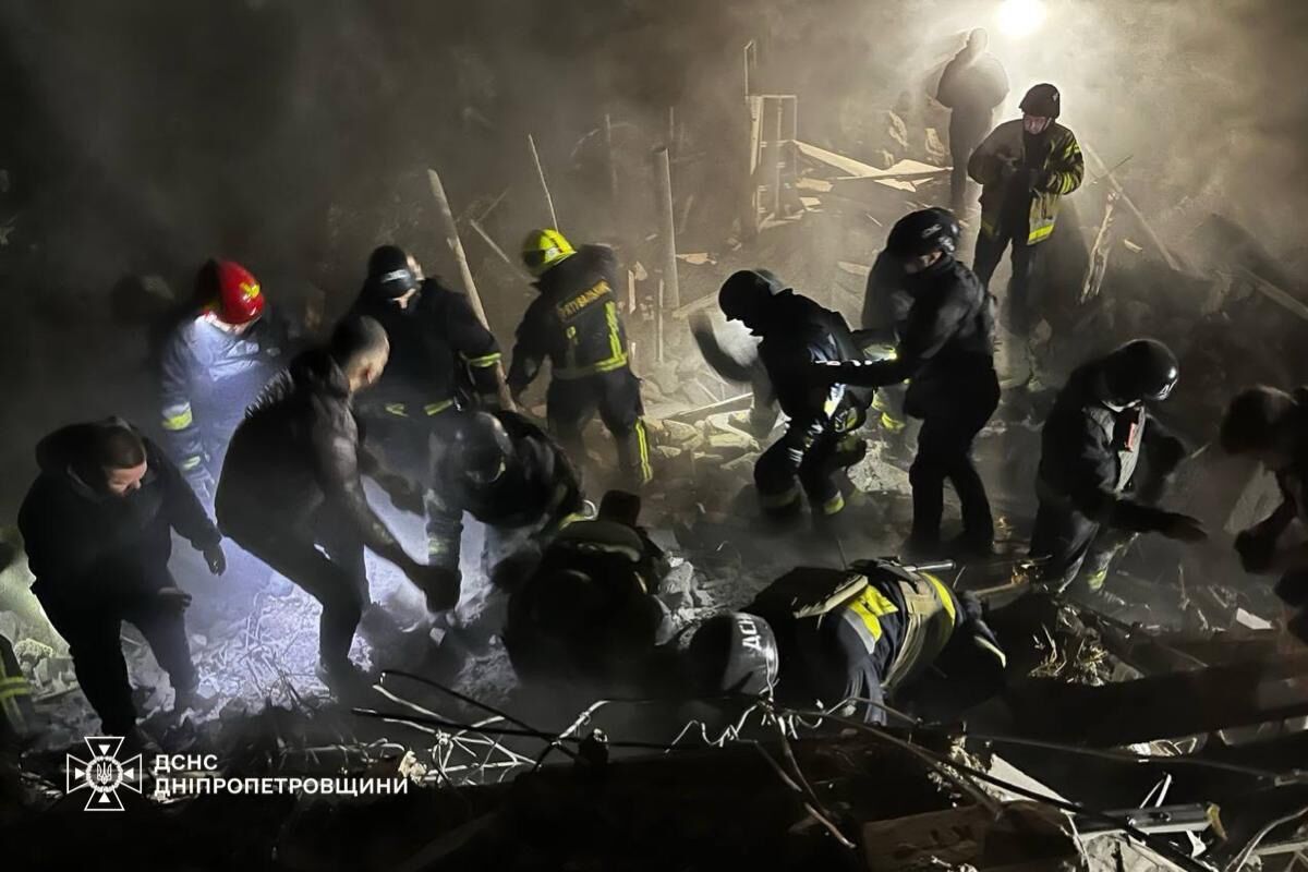 State Emergency Service rescues a woman from under the rubble after the Russian missile attack on Dnipro. Video