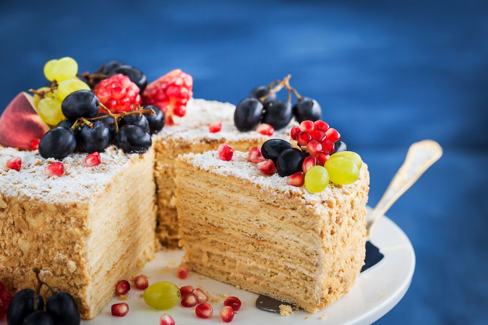 Honey cake with berries and fruit