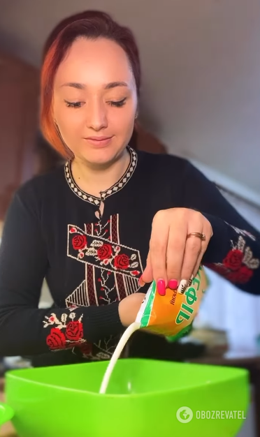 Pouring kefir into a bowl