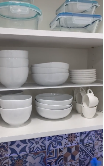 How to properly arrange dishes in the cabinets.