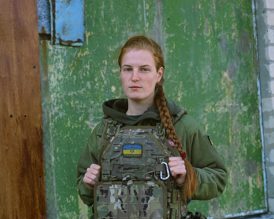 Without boots and ammunition. Red-haired warrior princess Oksana Rubaniak struck the network with an unexpected image in a tight dress