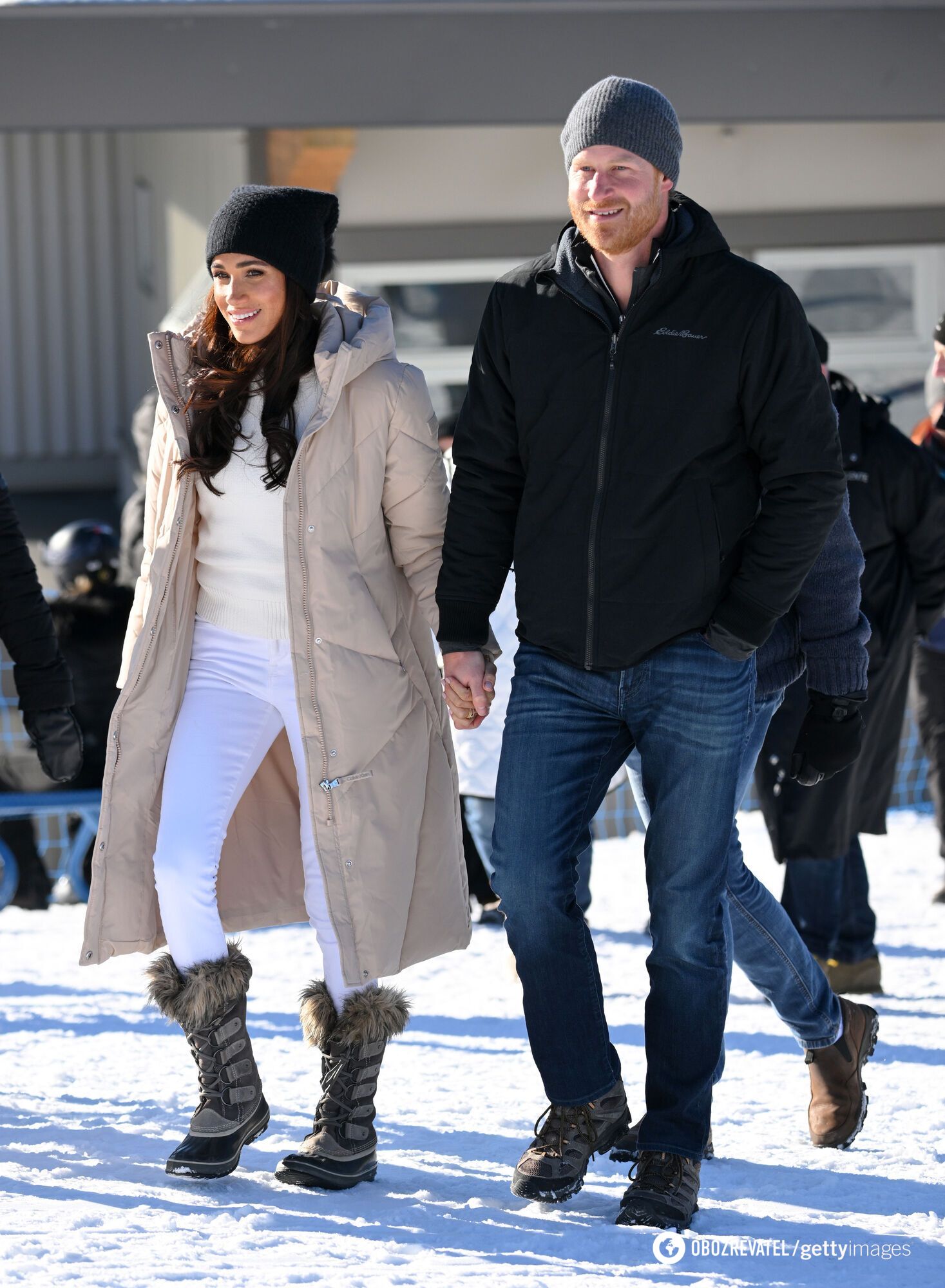 Calvin Klein down jacket and cashmere sweater by Victoria Beckham. Meghan Markle showed a stylish look at a ski resort in Canada