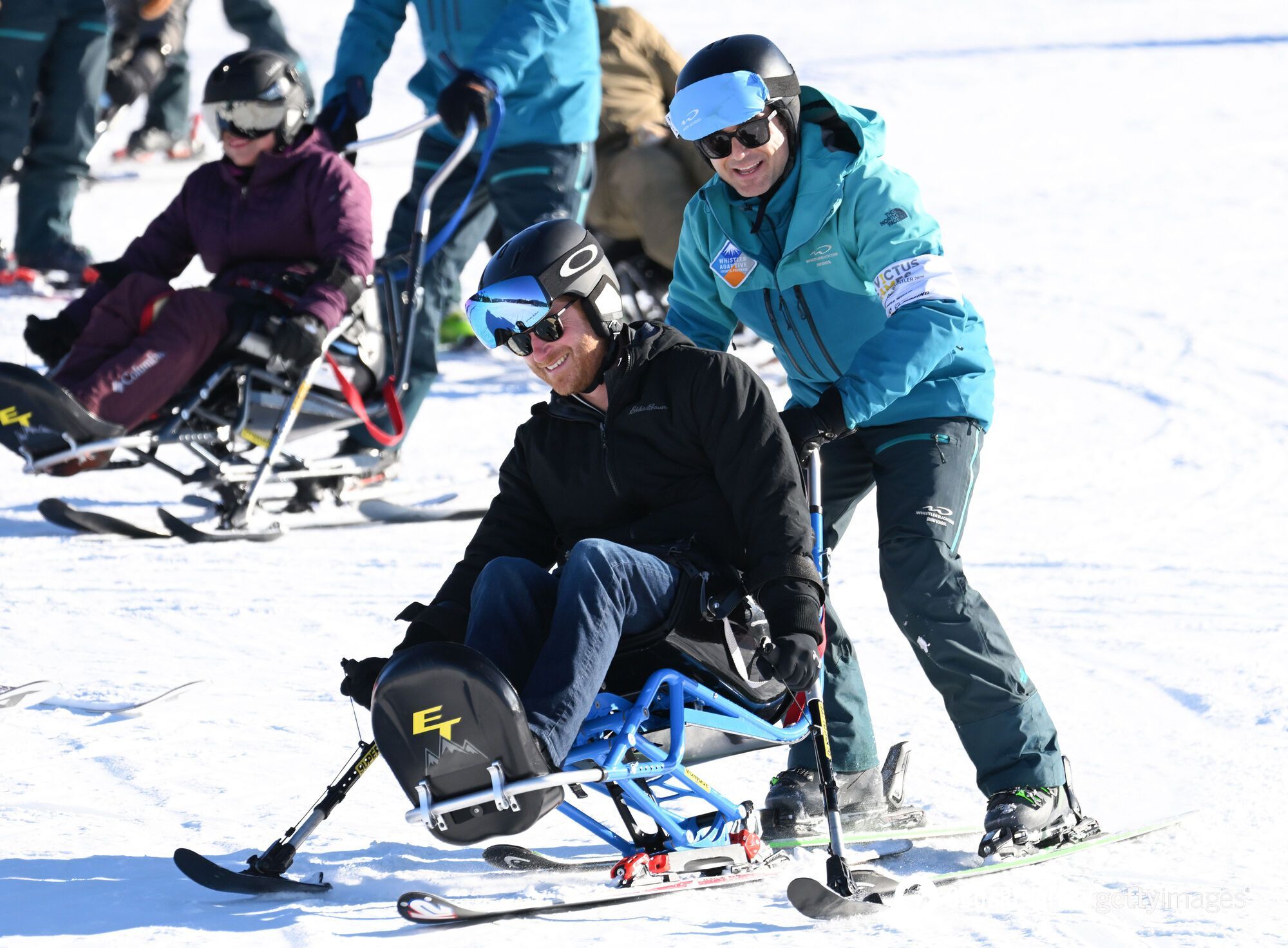 Calvin Klein down jacket and cashmere sweater by Victoria Beckham. Meghan Markle showed a stylish look at a ski resort in Canada