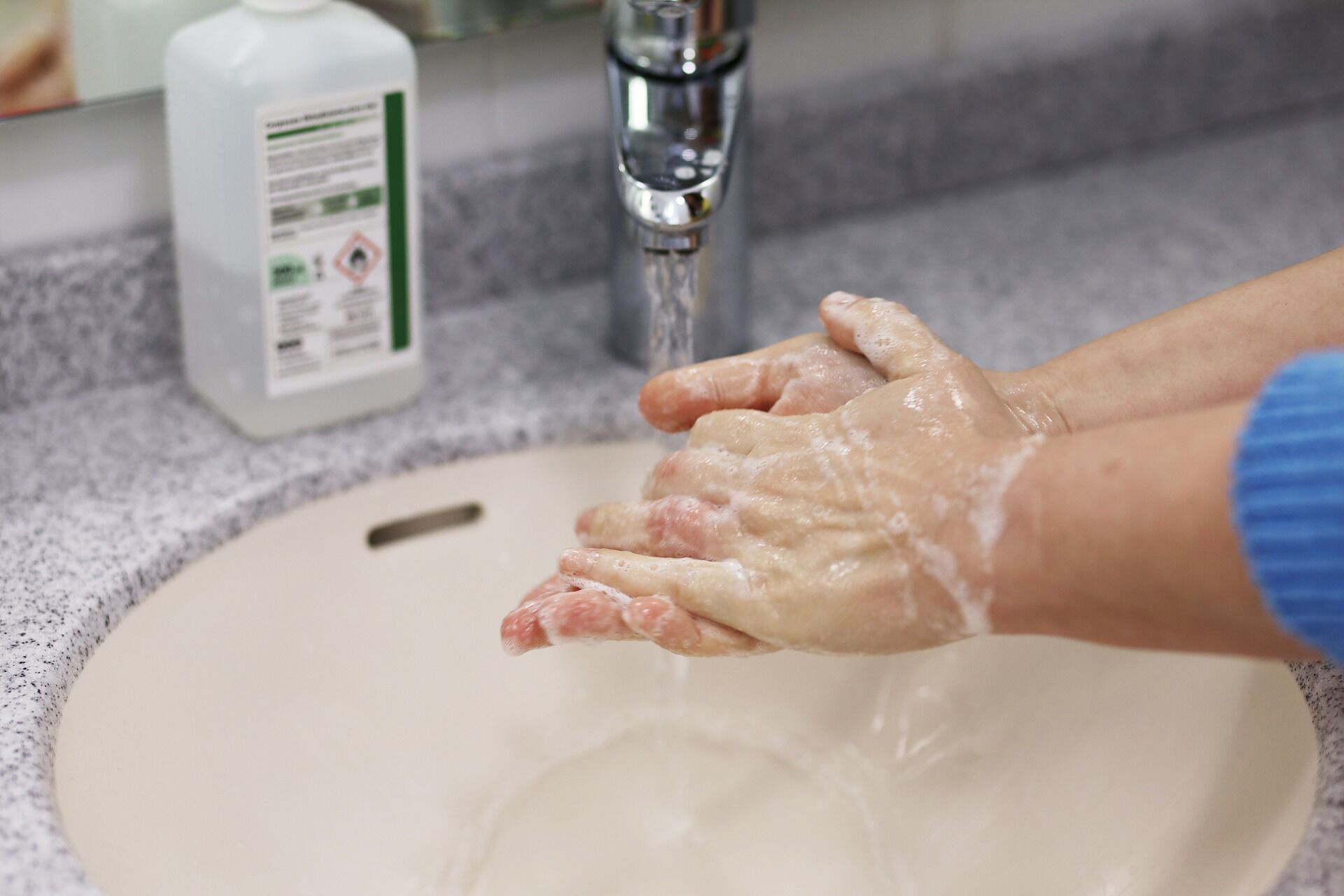 Warm water and soap will help remove superglue from the skin.