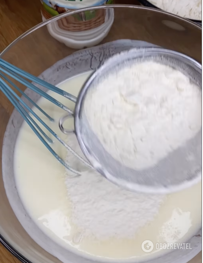 Preparing the dough for pancakes