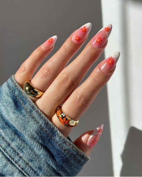 With flowers and hearts. 10 delicate spring manicure ideas that will suit all women