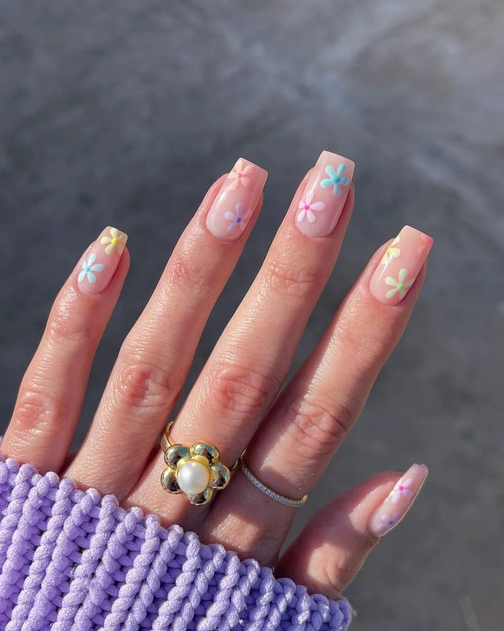 With flowers and hearts. 10 delicate spring manicure ideas that will suit all women