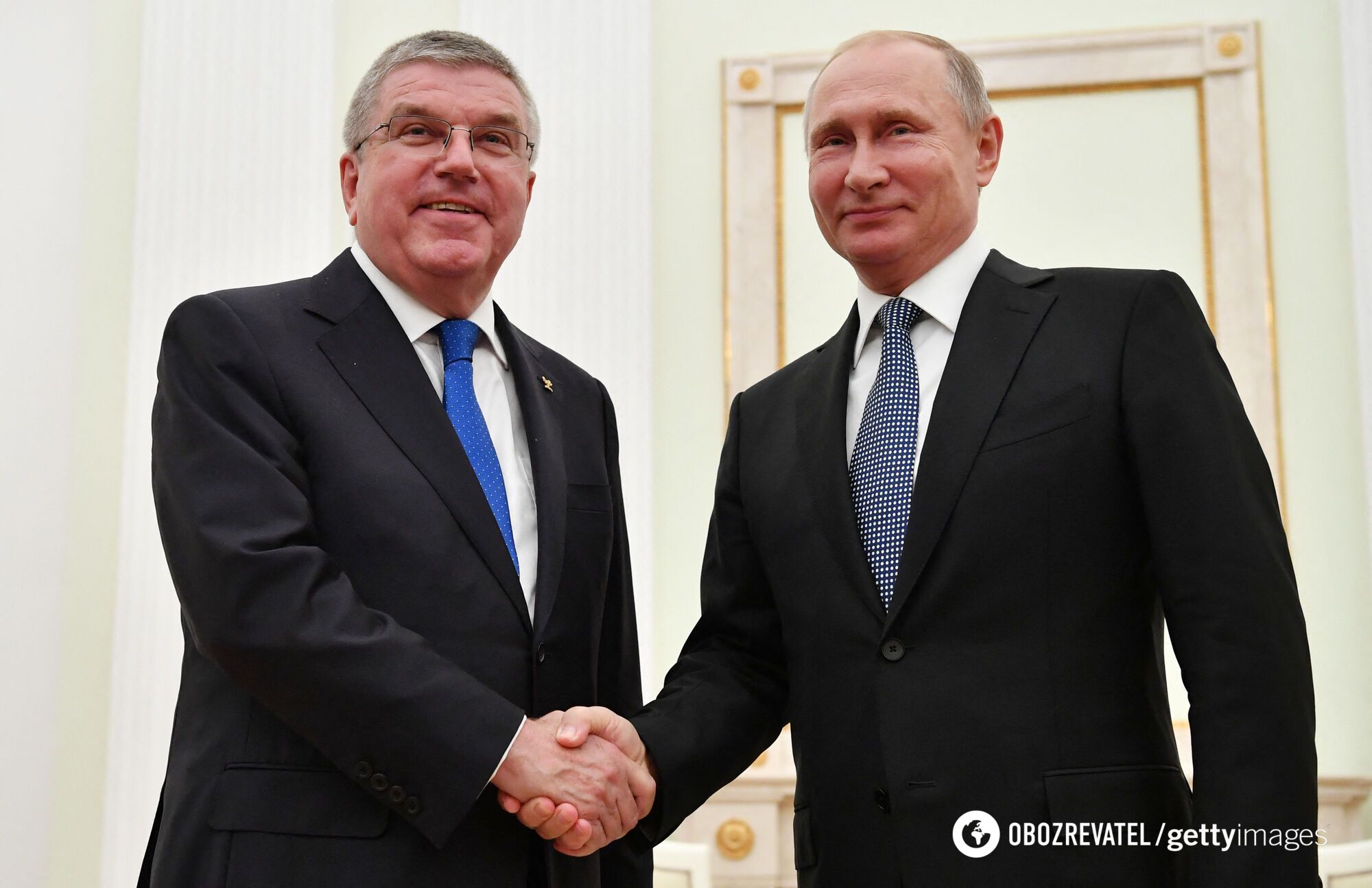 Przewodniczący MKOl Thomas Bach i Władimir Putin