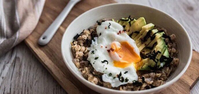 Oatmeal with poached egg for breakfast