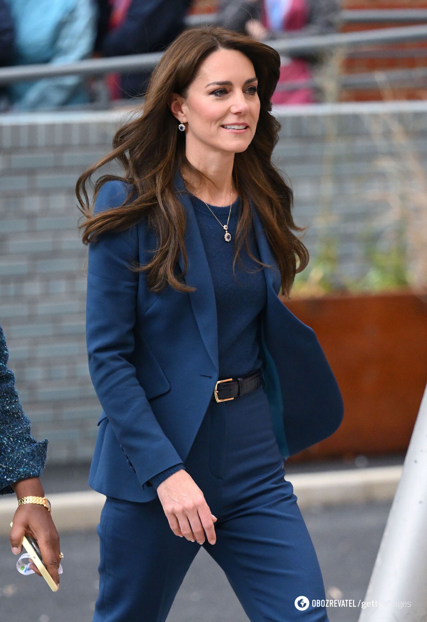 The bricks are different. Signs of photoshop were found on another photo of Kate Middleton