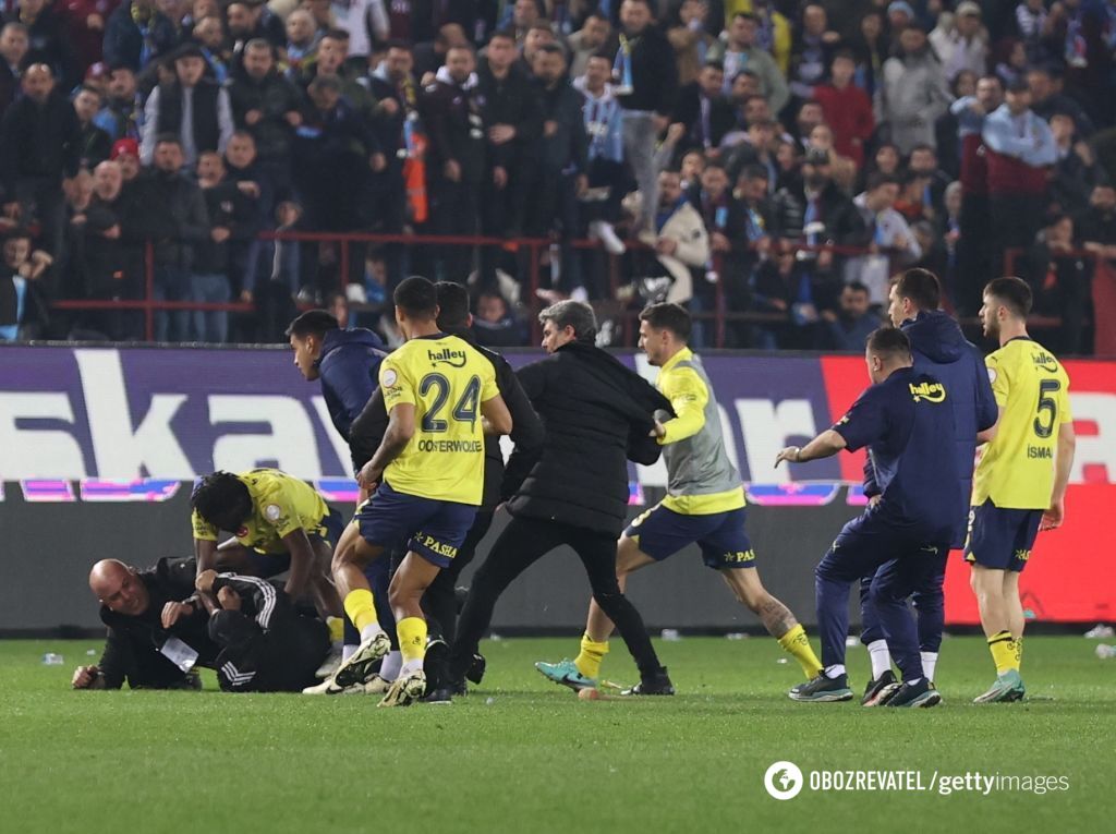 The Turkish championship match ended in a huge brawl between players and fans. Photos