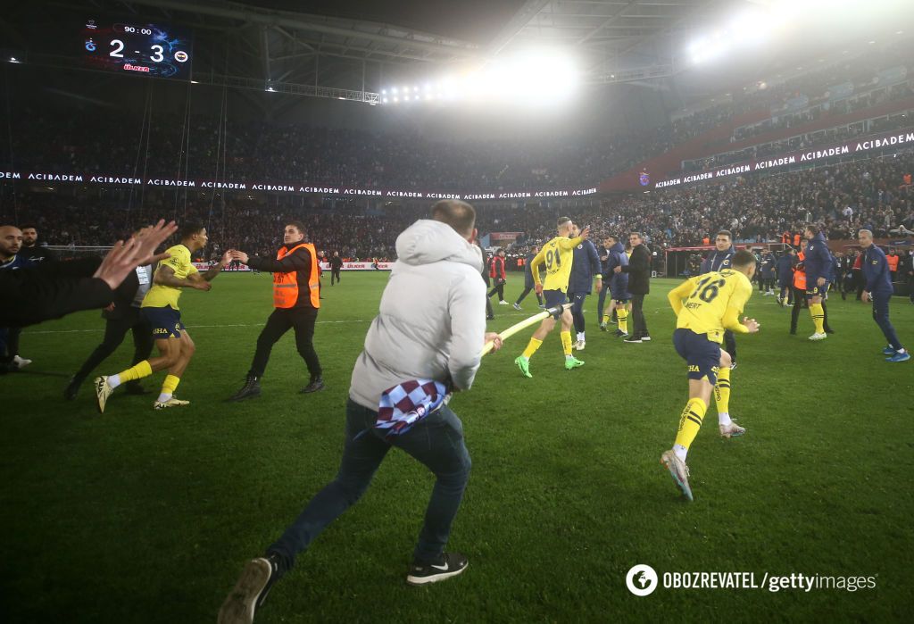 The Turkish championship match ended in a huge brawl between players and fans. Photos