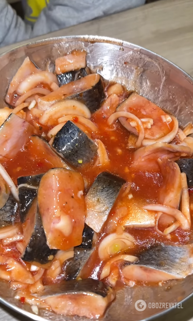 Pickled herring in satsebeli sauce that can be eaten the next day