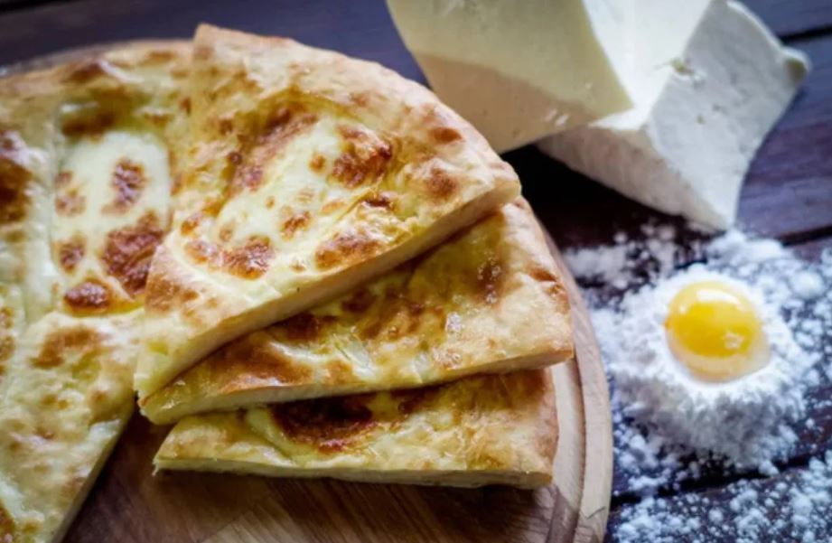 Lazy khachapuri with cheese in a pan