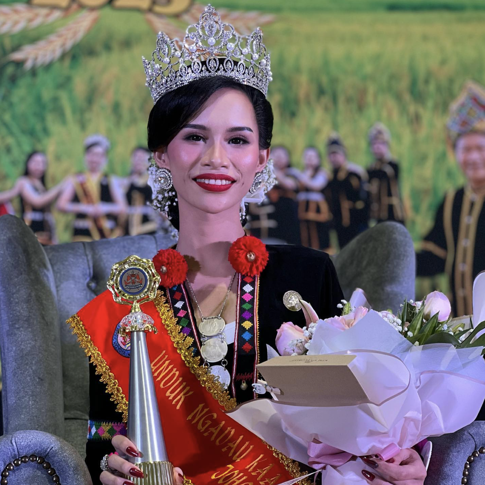 Malaysia's beauty queen was stripped of her title for ''wild dancing'' with half-naked men in Thailand. Photo.