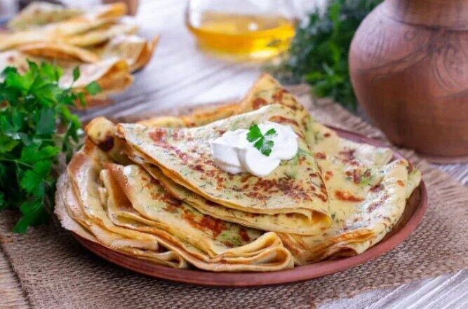 Pancakes with cheese and herbs