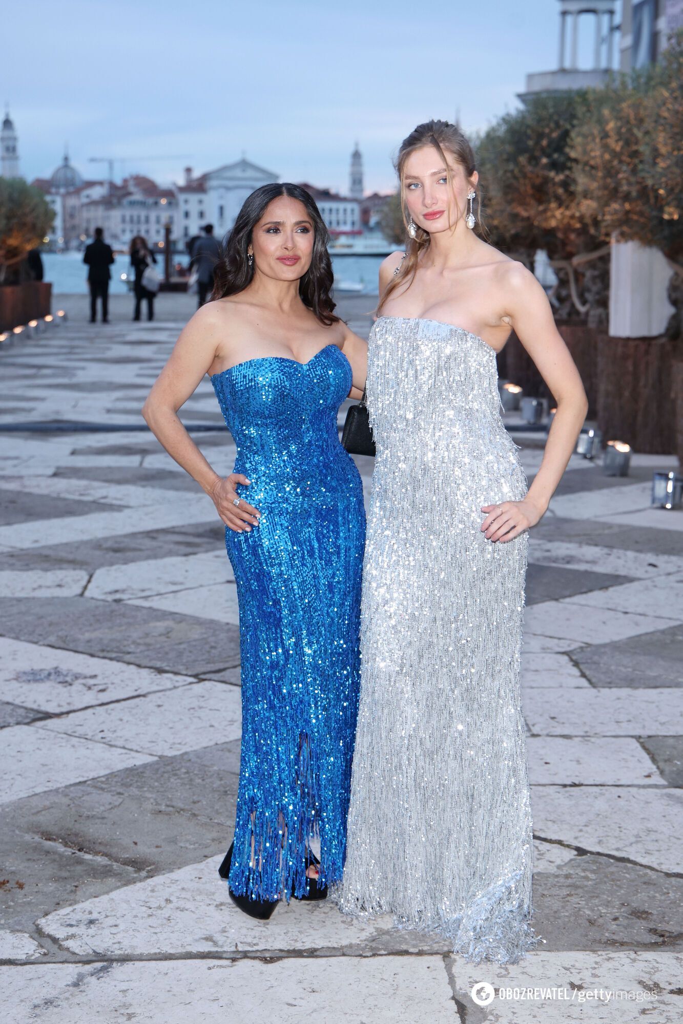 Like two sisters. 57-year-old Salma Hayek and her 23-year-old stepdaughter went out in dazzling sequined dresses