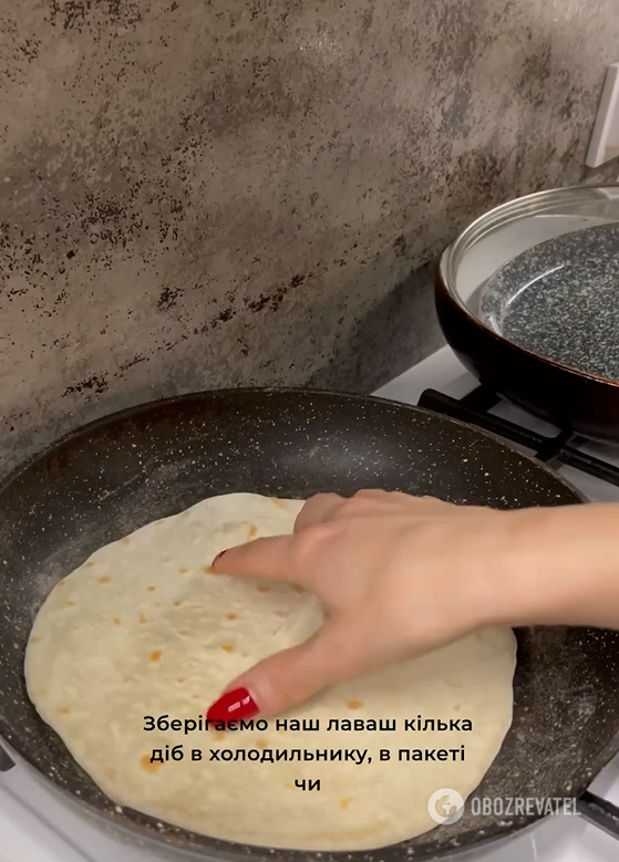 Homemade thin pita bread on water: fried in a pan